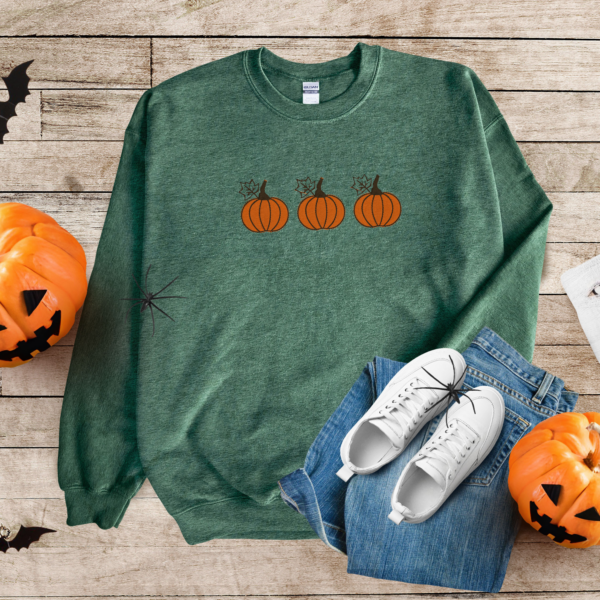 Embroidered pumpkins on Sweater