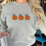 Embroidered pumpkins on Sweater