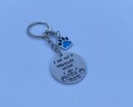 ‘I am not a regular mom I am a dog mom’ hand stamped keychain