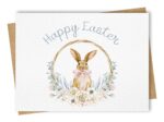 Paper Kuts - An Easter card with a watercolour floral wreath surrounding an adorable bunny