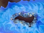 Blue Vortex Resin geode slice center ring of crystals-stand included