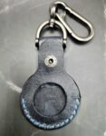 Veg-tanned Leather Apple AirTag Holder with Navy Handled Guns Handcrafted from Premium Quality Veg-Tanned Leather