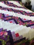 Handmade Fields and Furrows Log Cabin quilt