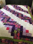 Handmade Fields and Furrows Log Cabin quilt