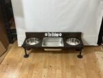 Raised water bin with 2 bowls on each end. Water Bin and Dual Feeder - tall dog bowl stand