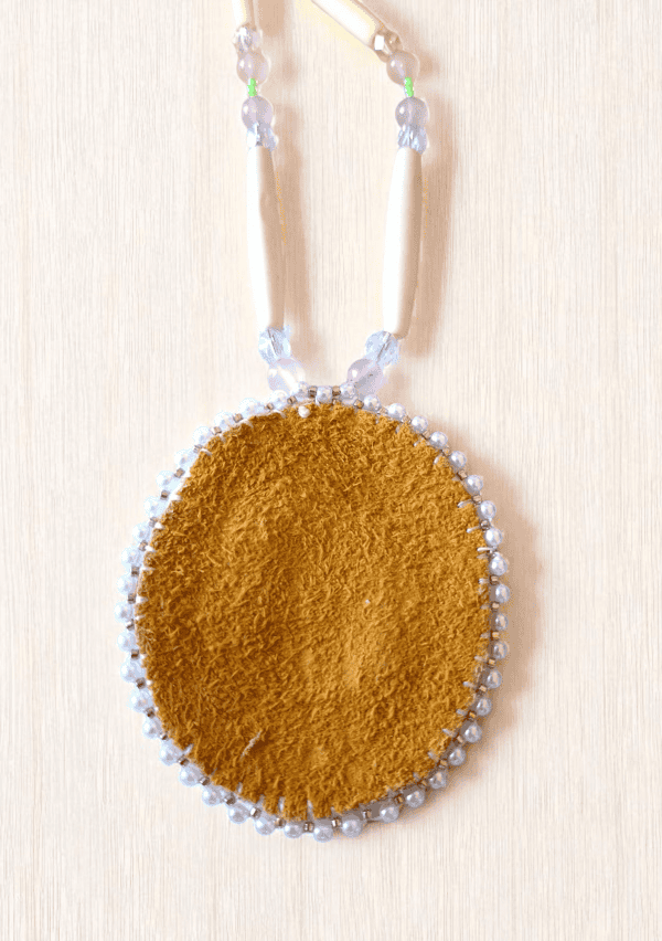Handcrafted Gaia Medallion: Indigenous Beaded Pendant for Earth Day Celebration