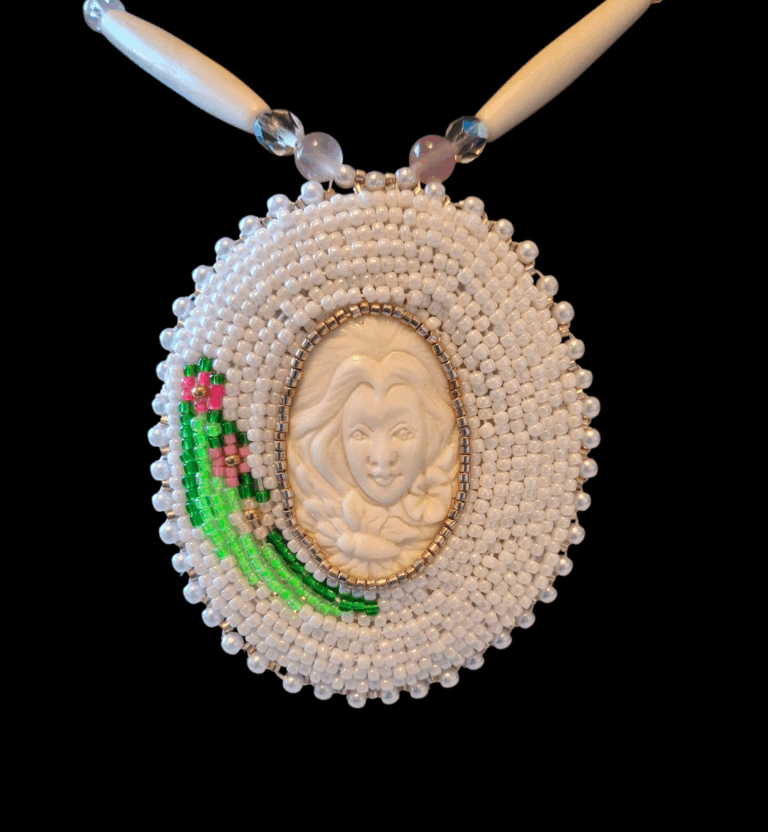 close up of beadwork on mother earth medallion