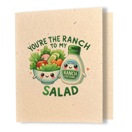 plantable greeting card, natural coloured paper, embedded with wildflower seeds, an image in kawaii style of a bowl of salad and a bottle of ranch dressing holding hands, the sentiment reads, you're the ranch to my salad