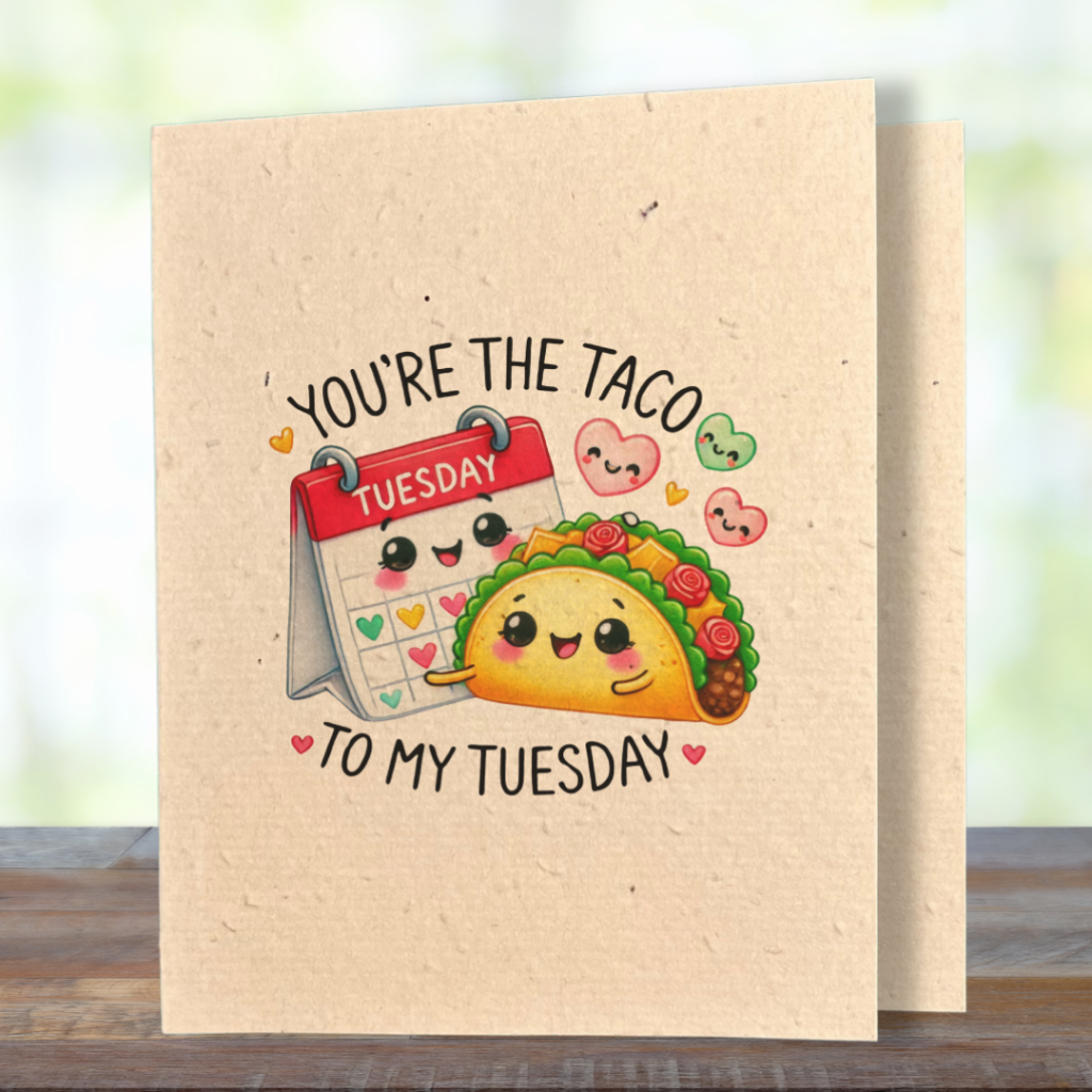 plantable greeting card, natural coloured paper, embedded with wildflower seeds, an image in kawaii style of a mini calendar set to the day Tuesday and a taco side by side, the sentiment reads, you're the taco to my tuesday