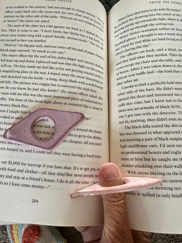 book thumb holder