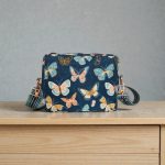 Butterfly Print Crossbody Bag: Waterproof Canvas with Rose Gold Hardware