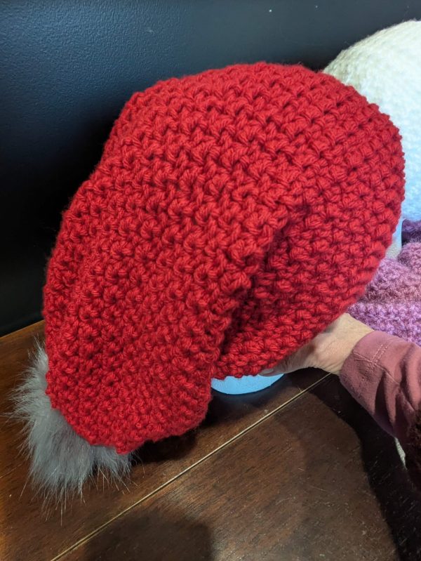 Slouchy Beanie in red with grey pompom