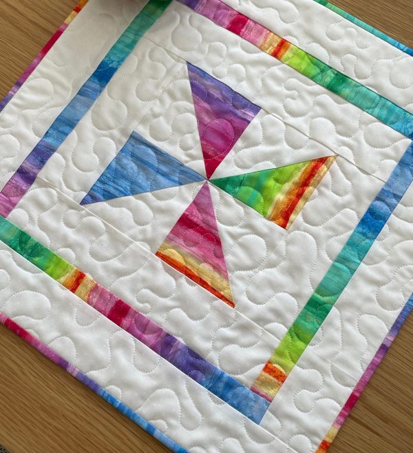 Quilted Colourful Pinwheel Table Topper