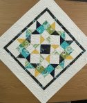 Quilted Star Burst Table Topper