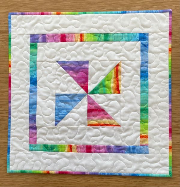 Quilted Colourful Pinwheel Table Topper