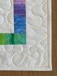Quilted Colourful Pinwheel Table Topper