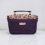 Eggplant color with accent purple flower cork fabric, rose gold hardware, minimalist bag.