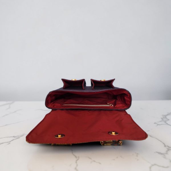 Eggplant color with accent purple flower cork fabric, rose gold hardware, minimalist bag.