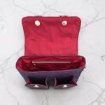 Eggplant color with accent purple flower cork fabric, rose gold hardware, minimalist bag.