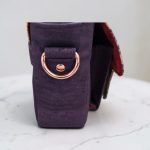 Eggplant color with accent purple flower cork fabric, rose gold hardware, minimalist bag.