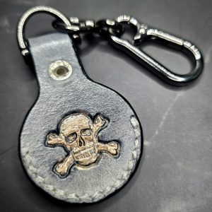 Charcoal Gray Apple Air Tag Holder with Skull and Crossbones Handcrafted from Premium Quality Veg-Tanned Leather