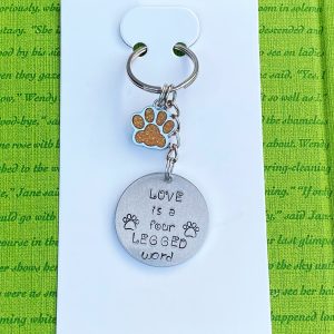 ‘love is a four legged word’ hand stamped keychain