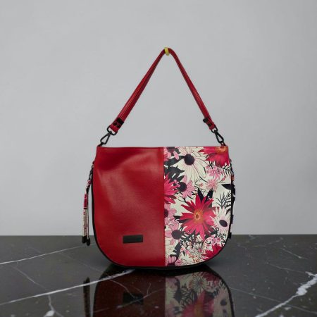 Red floral print slouch bag, matte black hardware.