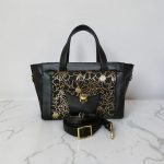 Structured Black Faux Leather Bag, Gold Floral Accent, Press Lock Hardware