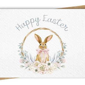 Paper Kuts - An Easter card with a watercolour floral wreath surrounding an adorable bunny