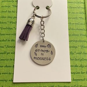 ‘any growth is progress’ hand stamped keychain