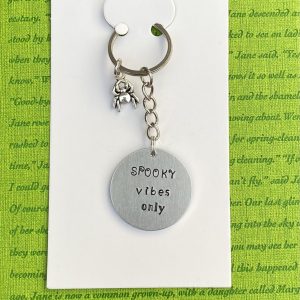 ‘spooky vibes only’ hand stamped keychain