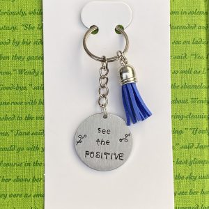 ‘see the positive’ hand stamped keychain