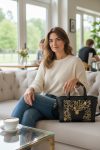 Structured Black Faux Leather Bag, Gold Floral Accent, Press Lock Hardware