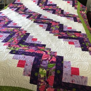Handmade Fields and Furrows Log Cabin quilt