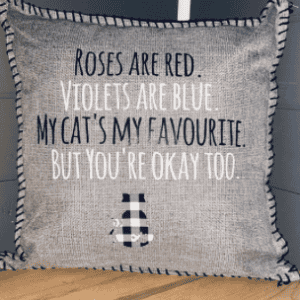 Roses are red. Violets are blue. My cat's my favourite. But you're okay too. Pillow Cover