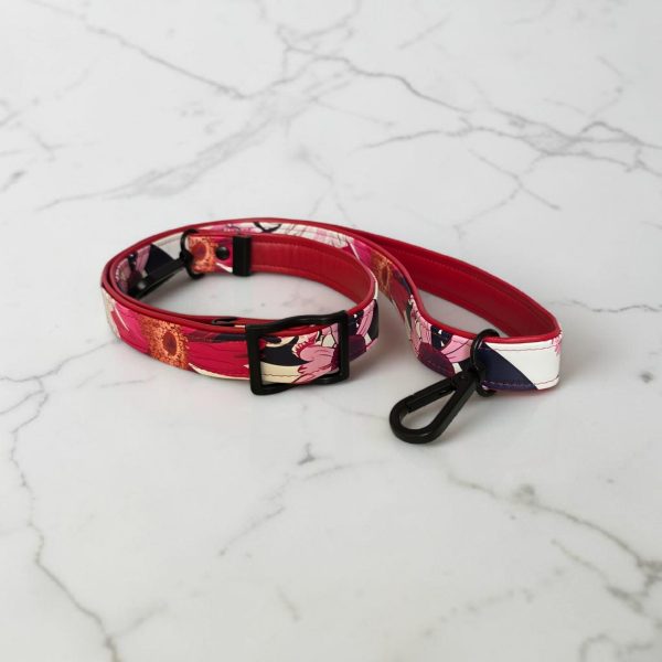Red floral print slouch bag, matte black hardware.