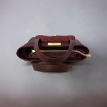Burgundy quilted faux leather with gold hardware mini bag