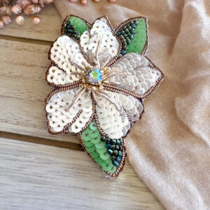 White poinsettia brooch